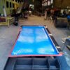 Ami-Flo shaking table with vulcanized rubber/urethane working surface on a fiberglass deck.